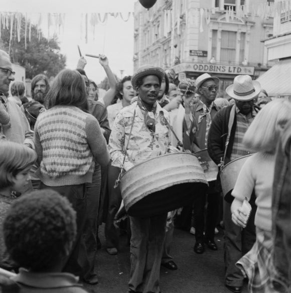 A steel drum player in a local festival at Belsize Park: 1975