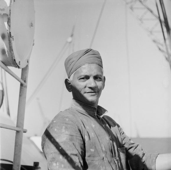 An Indian 'lascar' seaman at King George V Dock: 1959