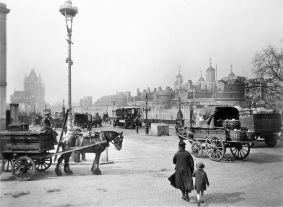 Street scene with tower of London in the distance: 20th century