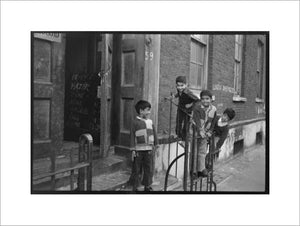 Children at the door of the Brick Lane Jamme Masjid Mosque: 1976