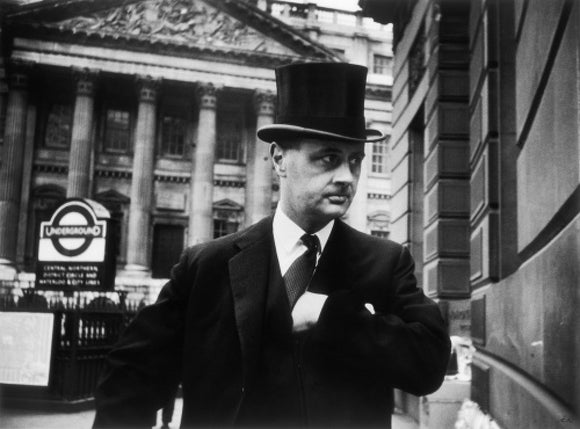 Gentleman in top hat and overcoat at Bank: 1961