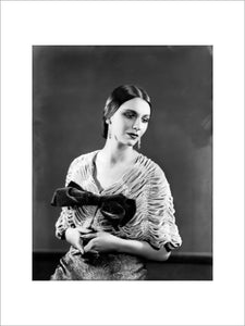 Image of a woman modelling eveningwear; 1934